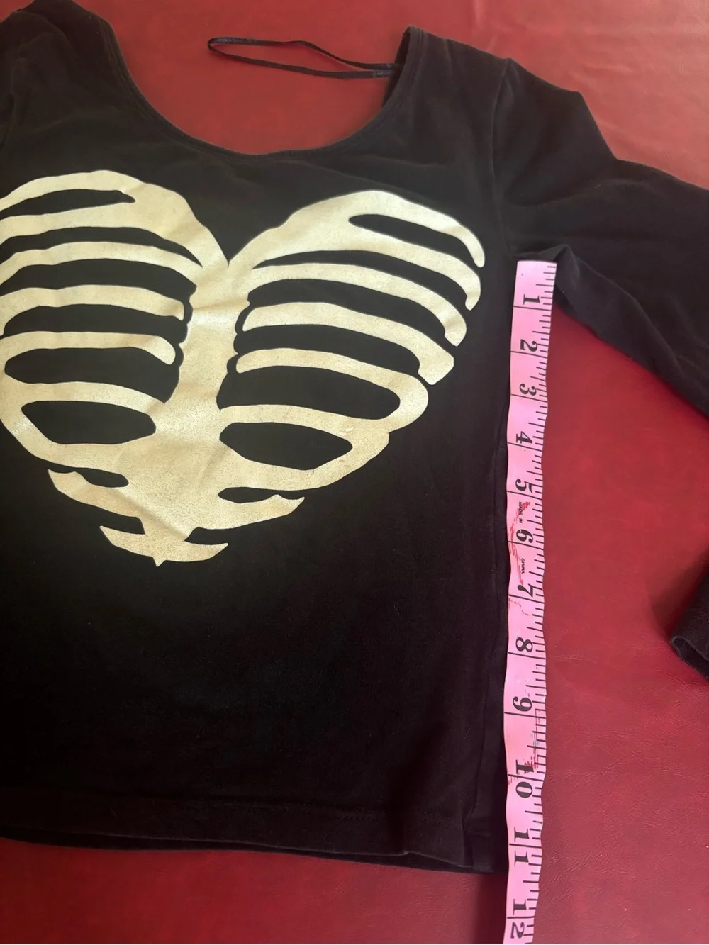 Black Long-Sleeve Top with White Ribcage Heart Graphic